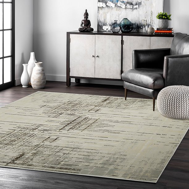 An area rug on a hardwood floor