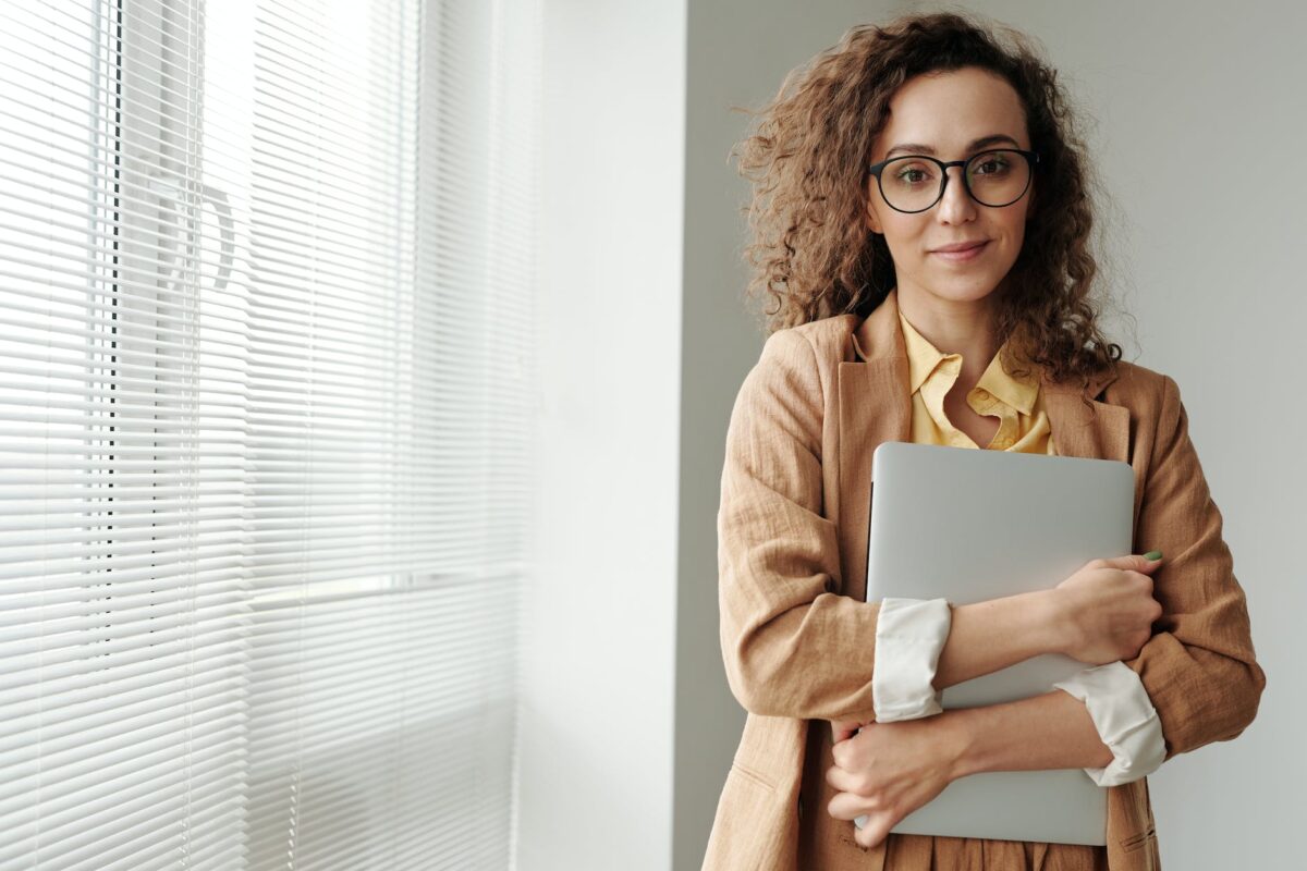 woman holding a laptop