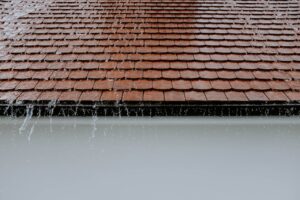 photo of roof while raining