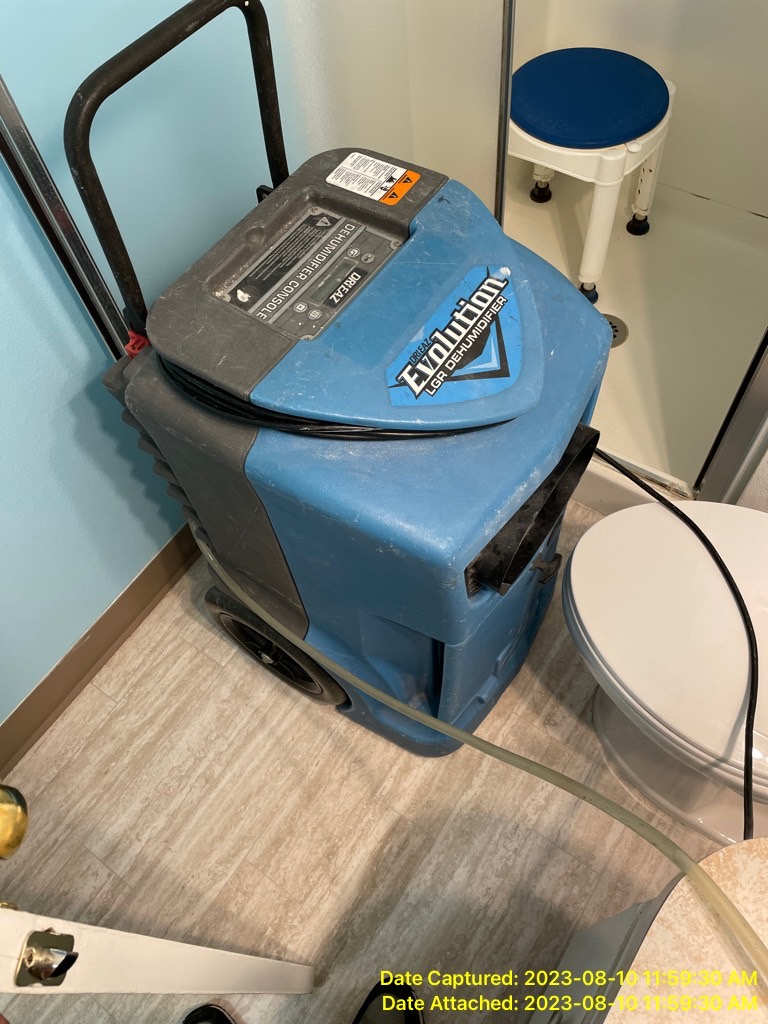 Image of dehumidifier operating as part of a water damage restoration Vancouver Wa case study.  One of the water damage companies in Vancouver WA.