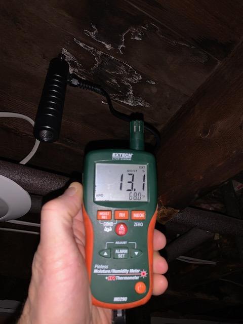 Image of a thermal hygrometer testing subfloor