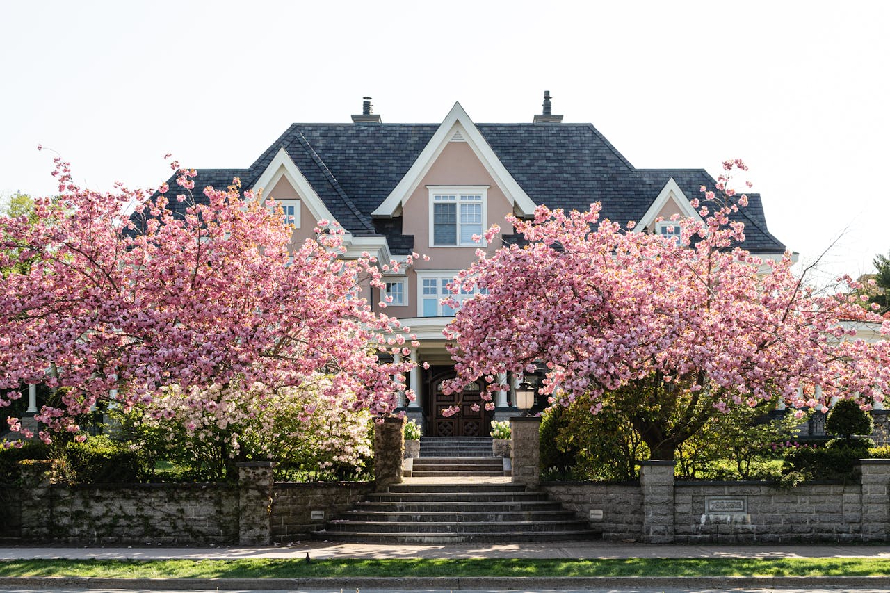 Benchmark featured home image of a house in spring